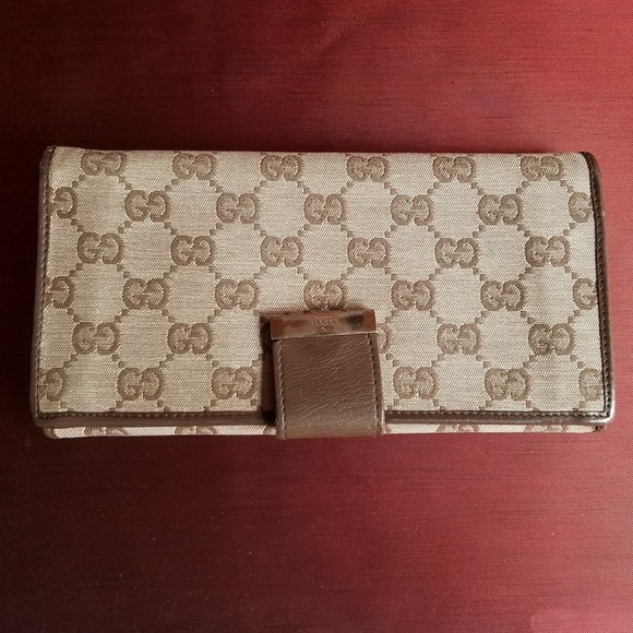 Gucci Handbags - GUCCI MONOGRAMED CANVAS long wallet